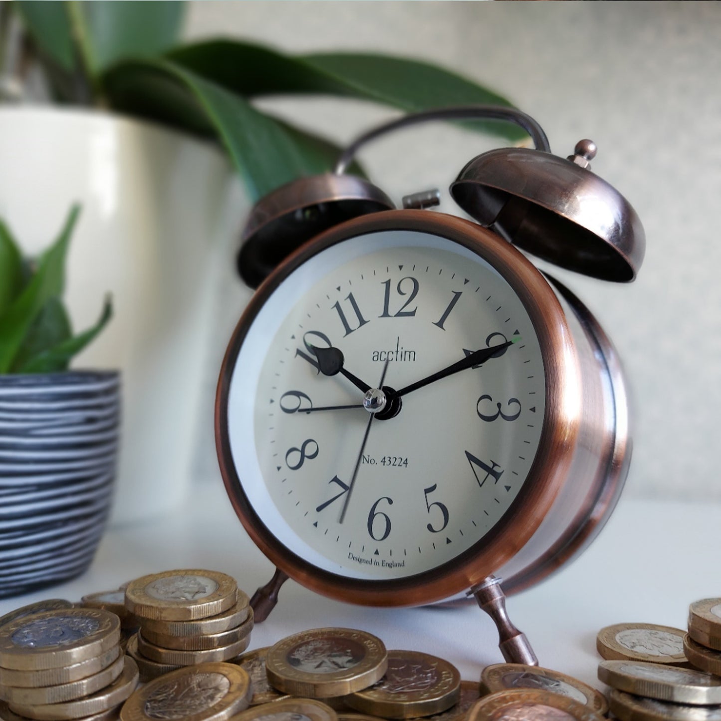 Image of a clock and money to represent time is money by Artisan IT Ltd